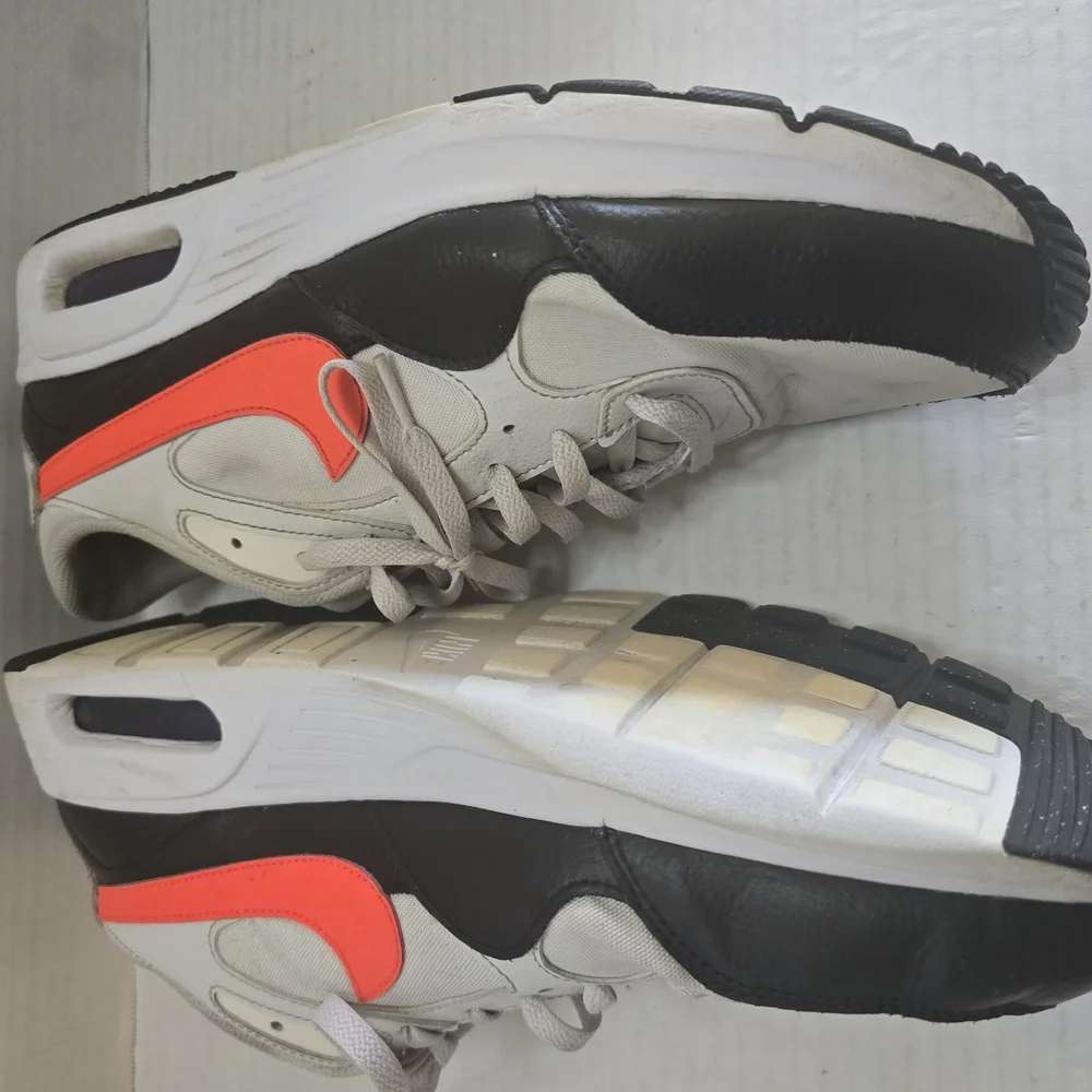 White and Black Athletic Shoes with Orange‎ Highlights